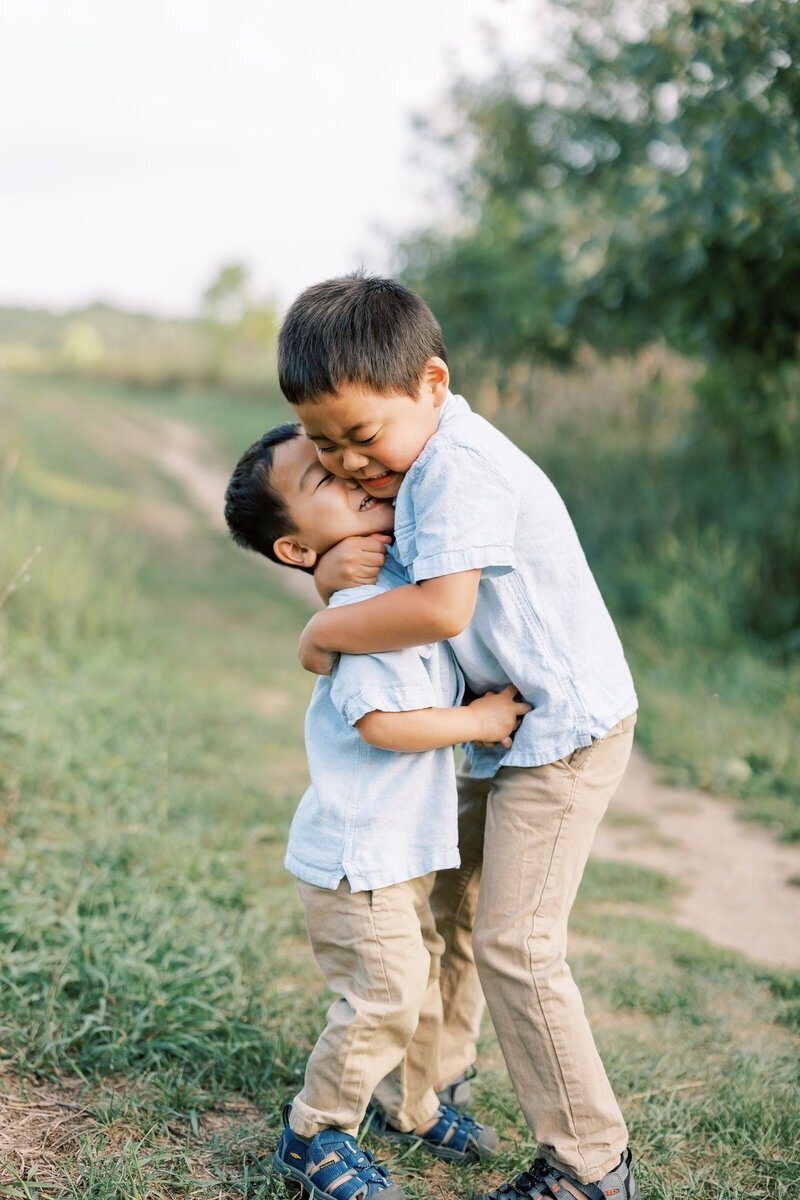 A loving portrait of two brothers, captured by Emily Barbara, a family photographer in Milwaukee.