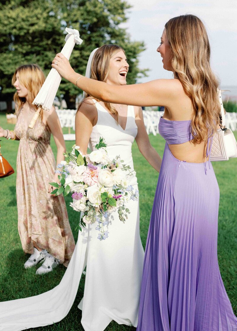 bride embracing friend