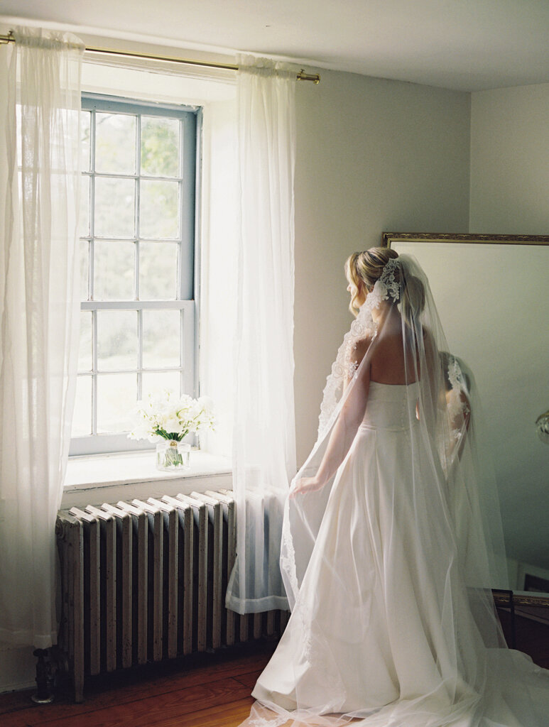 bride getting ready taken on film by film wedding photographers nicole simensky