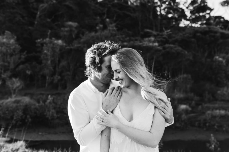 black and white image of engaged couple