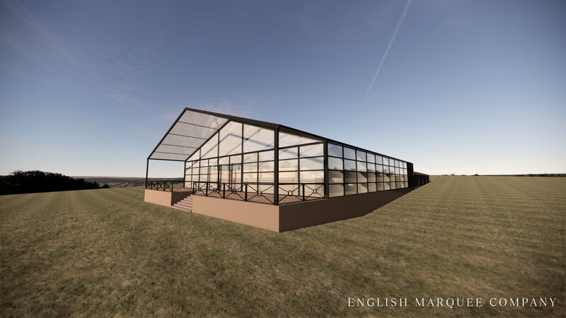 An aerial view of a glass marquee on a lawn with a long walkway and flowers at the entrance for Amelia and Olly Murs
