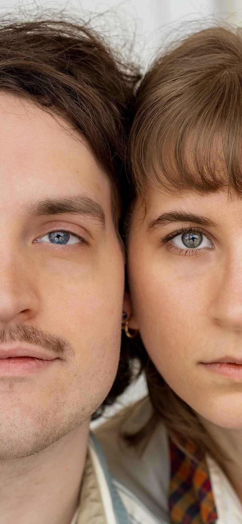 Artistic close up of a couple cheek to cheek during a couples session at the Indianapolis Central Library