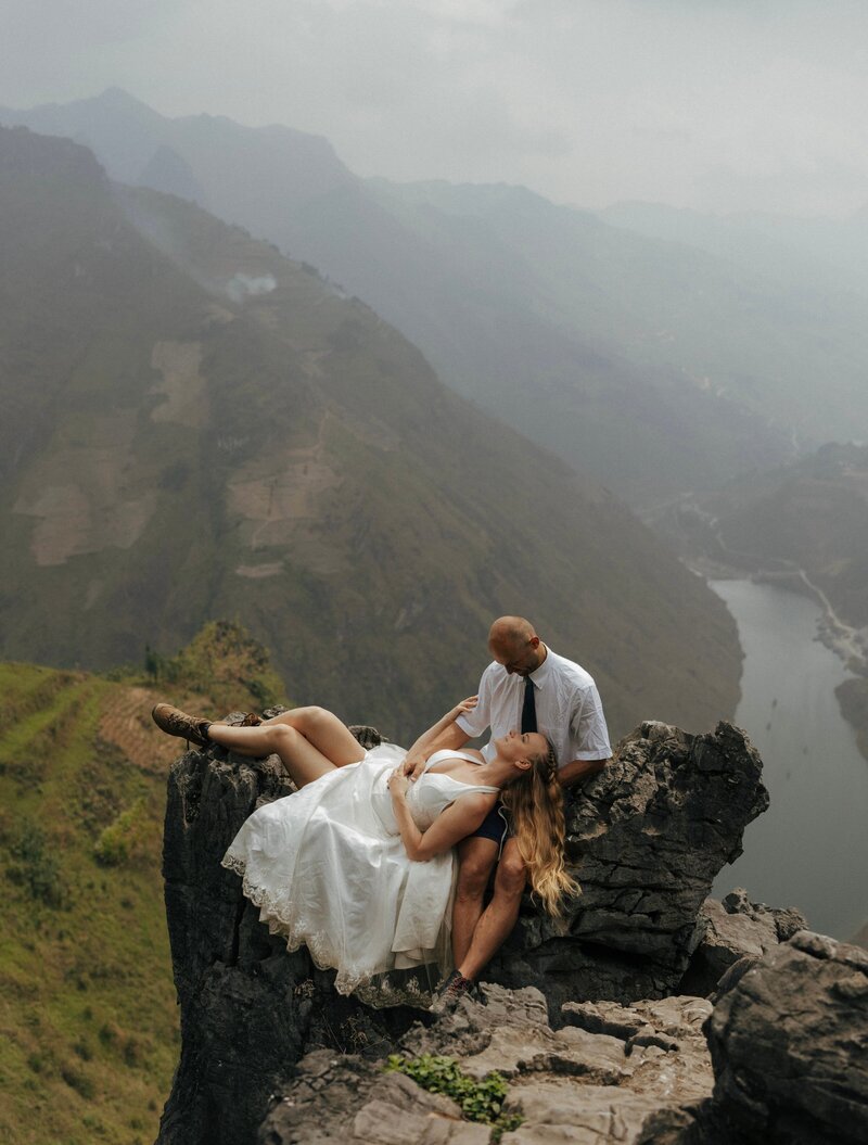 bride and groom holding hands