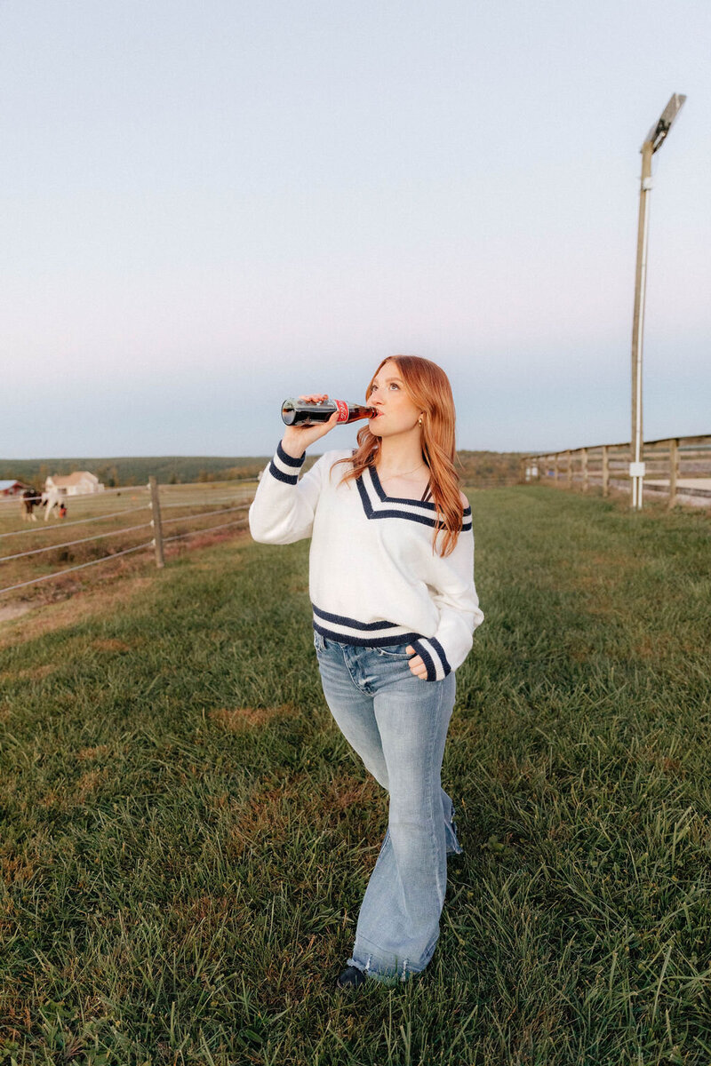 girl posing with drink