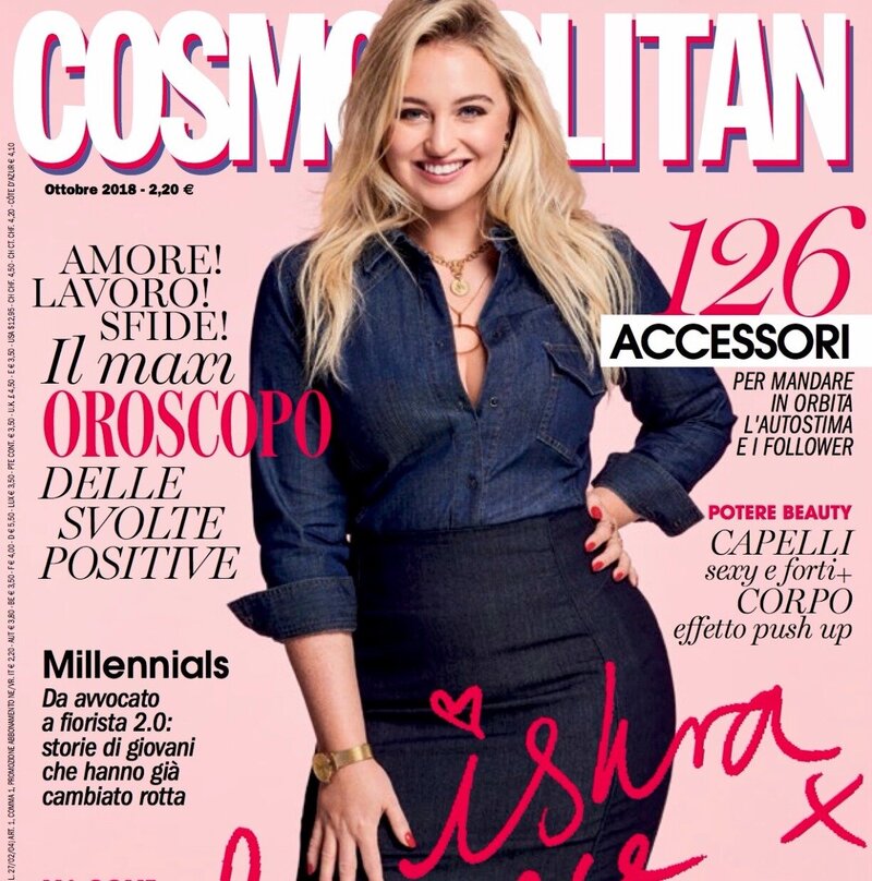 Iskra is posing with hand on her hip on the cover of a Cosmopolitan magazine.