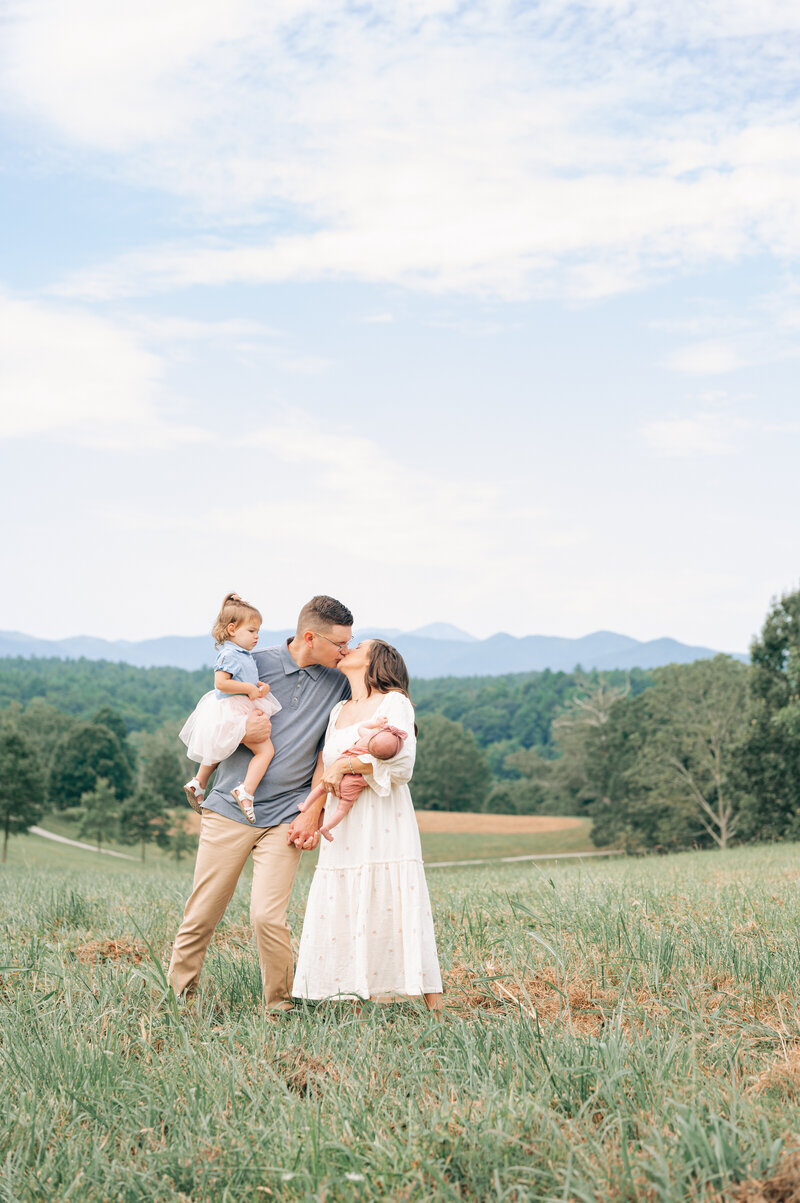 family photo session at the Biltmore Estate with toddler and newborn baby girl and Asheville Newborn Photographer