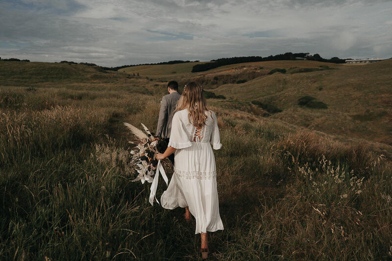 couple walking through the hills at Flinders Cliffs