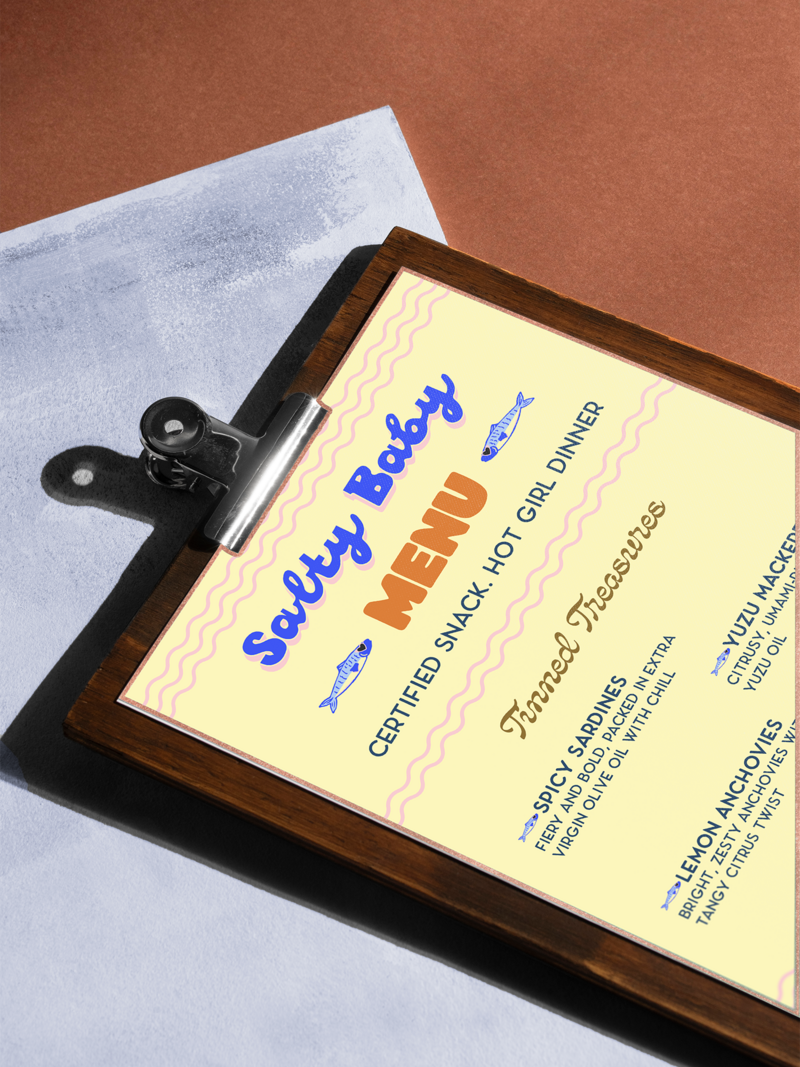 Salty Baby’s branding includes bold logo, packaging, and label design for boutique food & beverage entrepreneurs. Each element is strategically crafted to attract attention, communicate the brand story, and drive retail success.

Wildspark designed Salty Baby’s logo, packaging, and brand identity for women-led tinned fish and specialty food brands. Bold colors, playful design, and cohesive branding help founders attract their ideal customers.