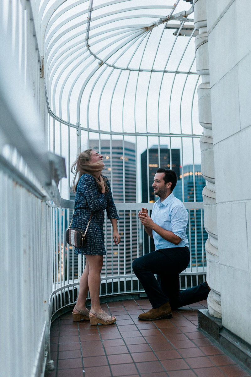 girlfriend says yes at smith tower engagement session