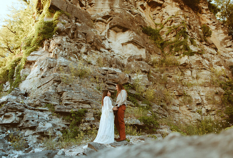 couple by rocks