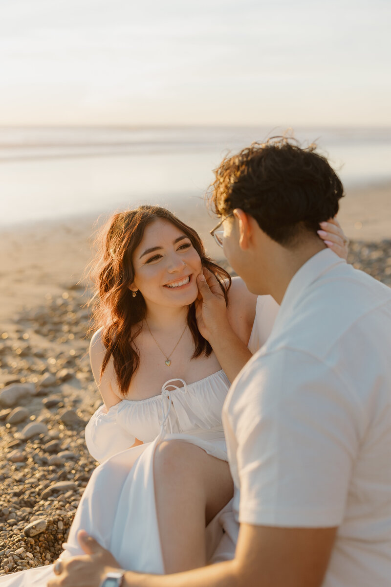 Engaged couple on a san diego beach