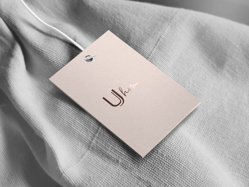 Behold the essence of me craft – a symbol of bespoke excellence. Witness a brand logo meticulously stamped onto paper, showcasing the artistry of a custom web design process at Elite Experience