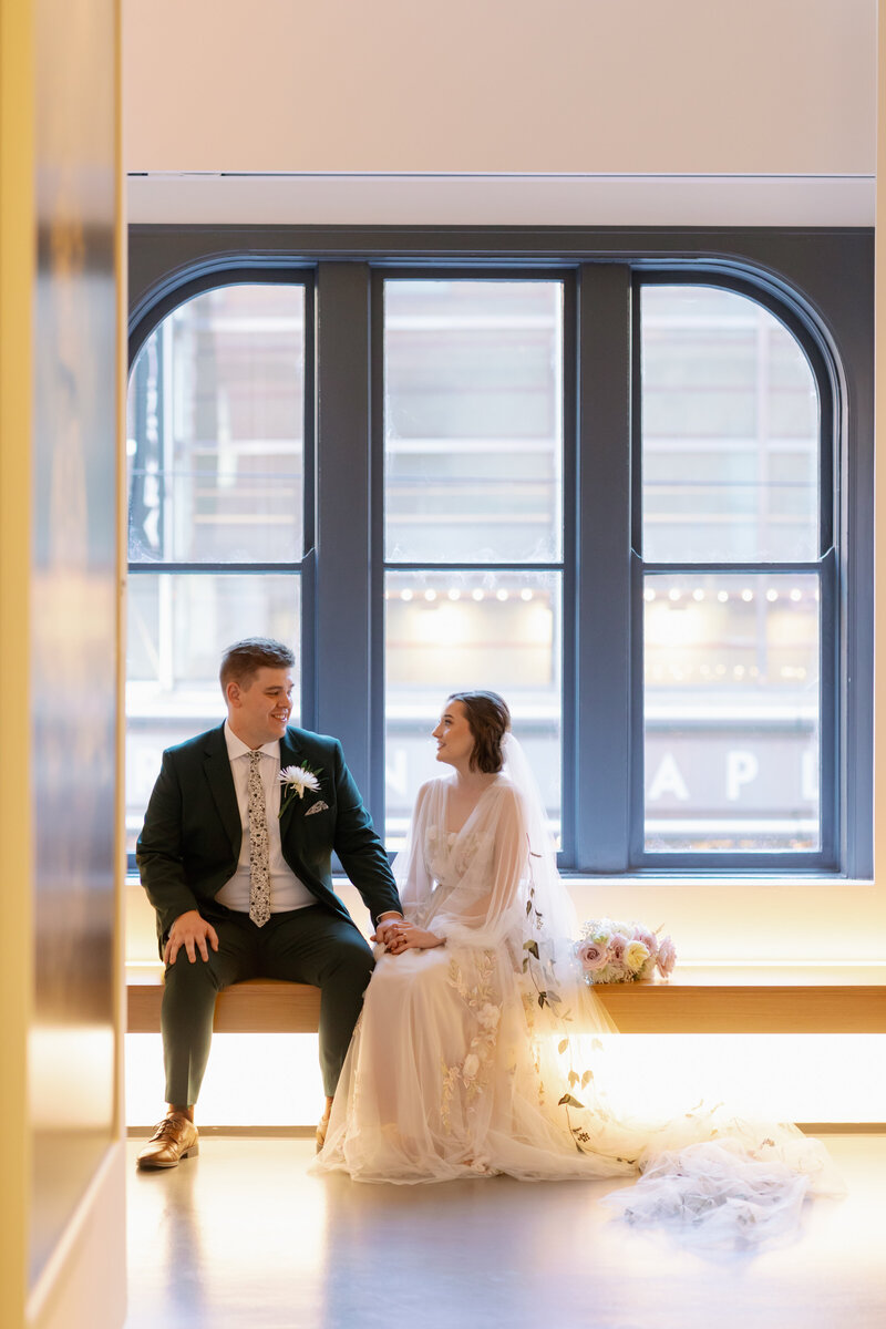 bride and groom enjoying a moment of quiet after vows