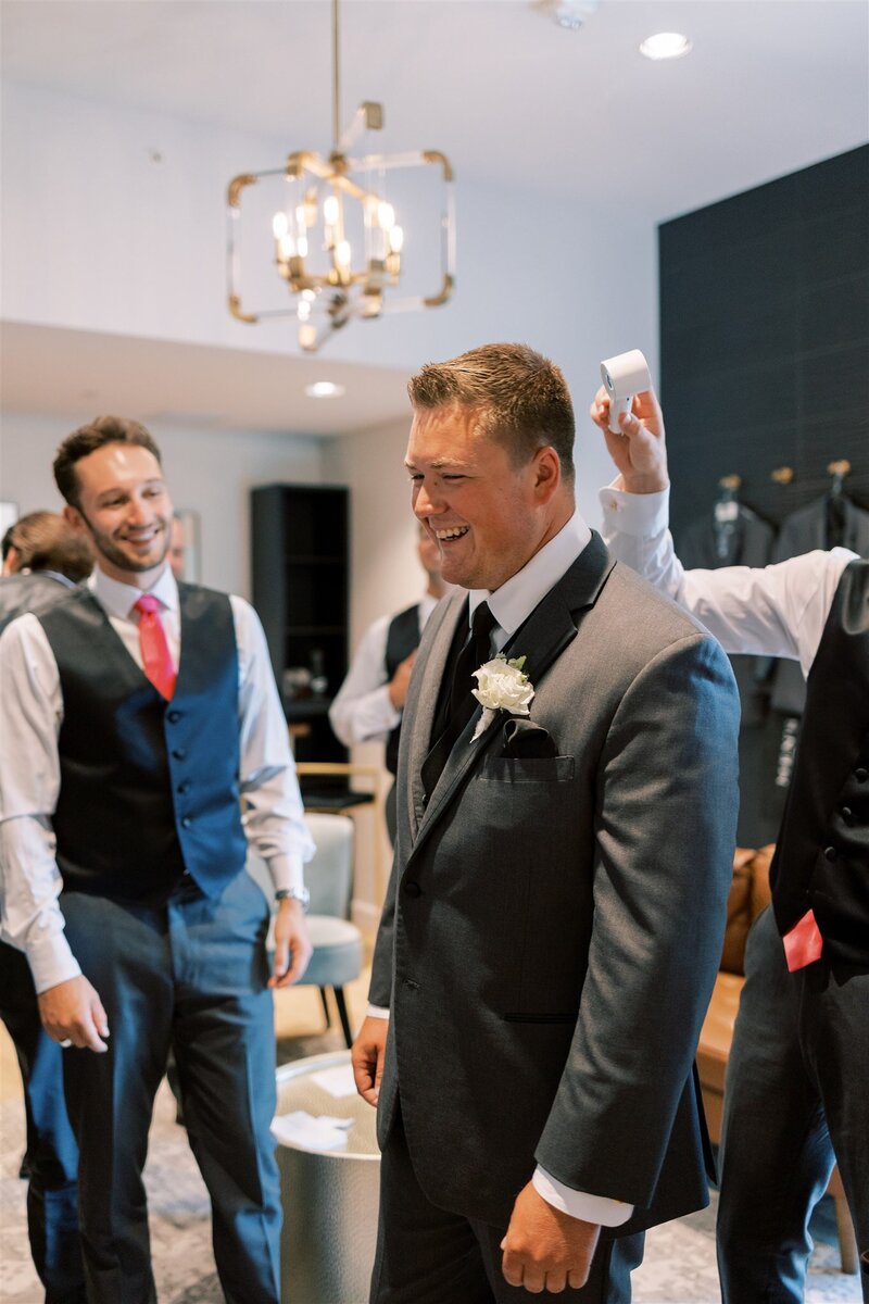 Groom celebrating with his groomsman