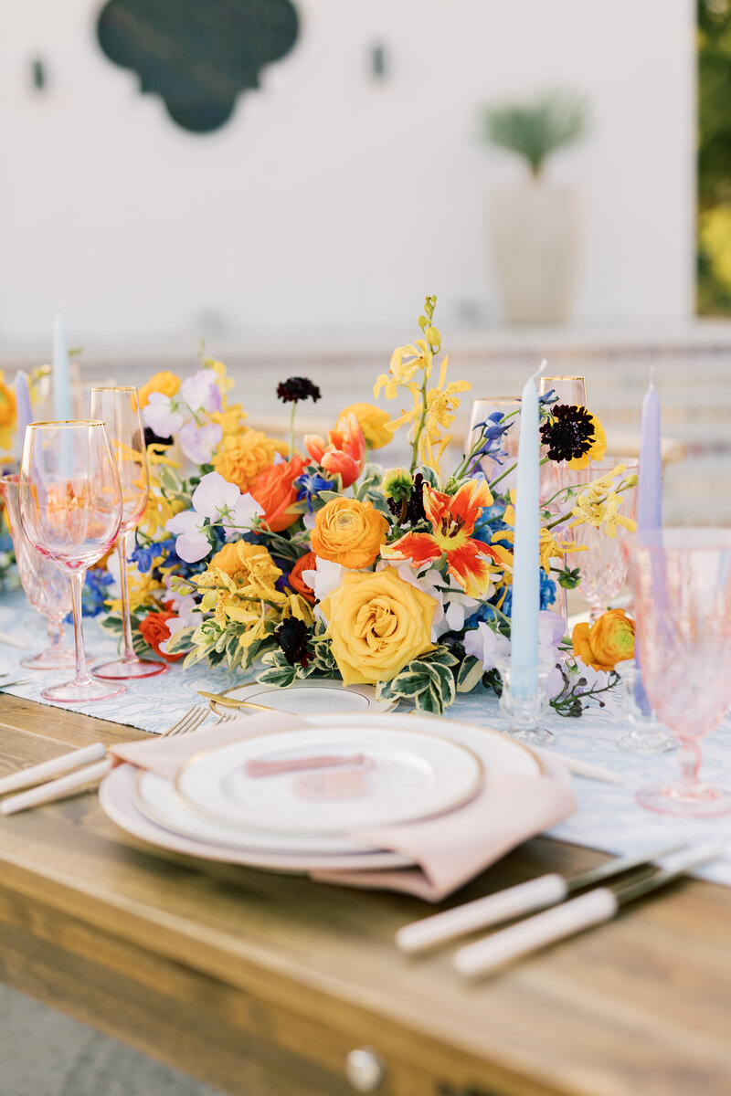 bright spring flowers placed on farm table