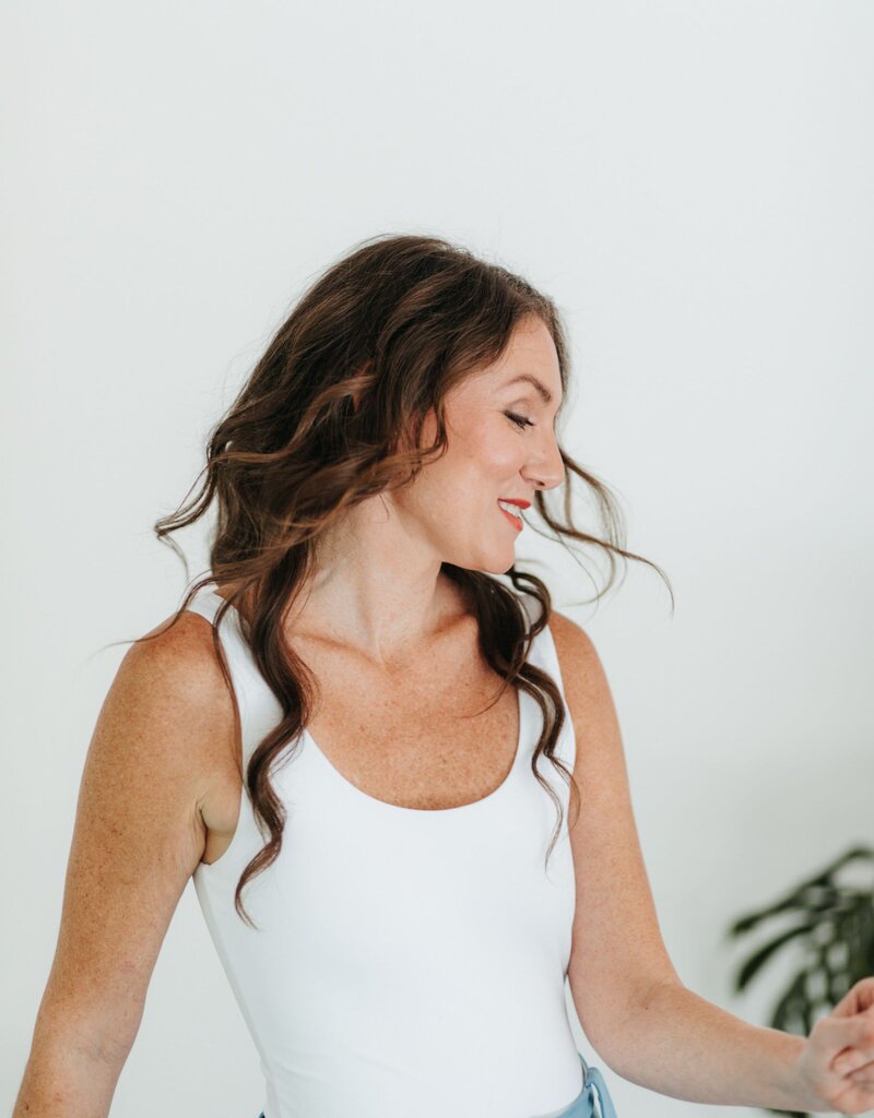 elizabeth in white shirt smiling