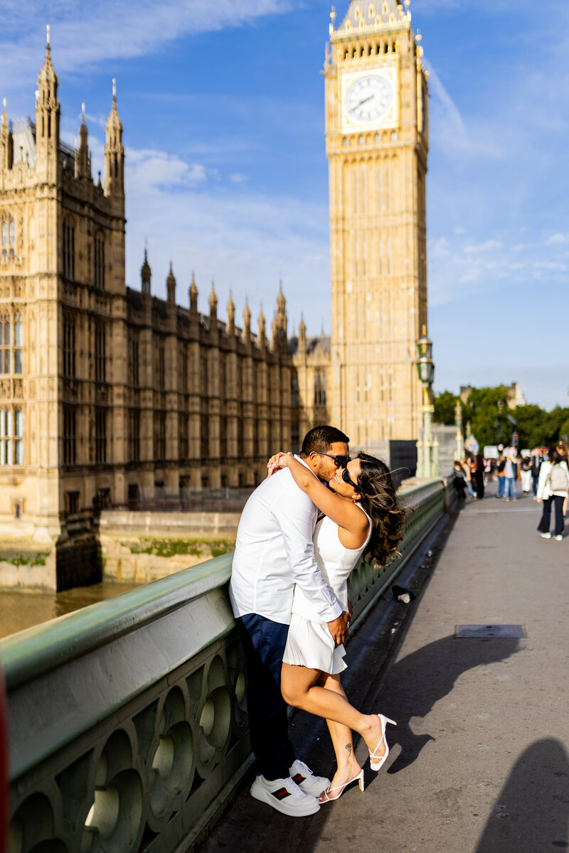engaged couple kissing under big ben london