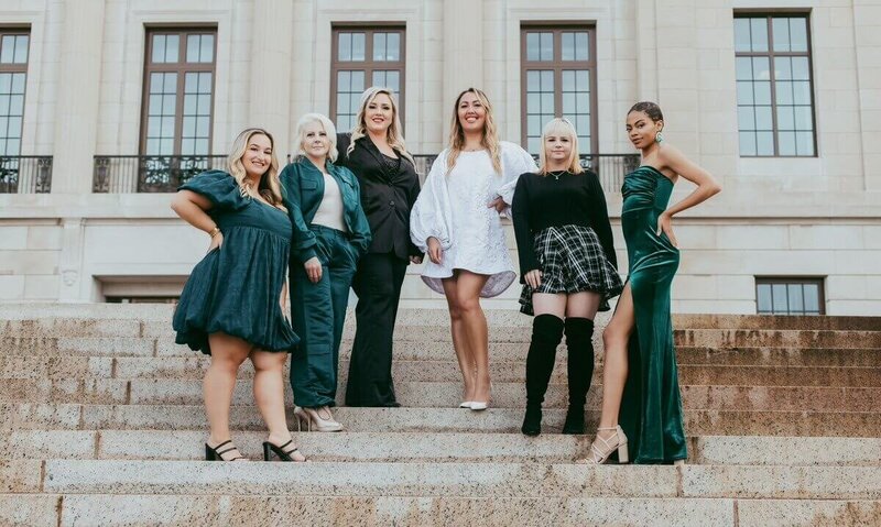 The Iconic Lash Team poses for a picture together on some stairs