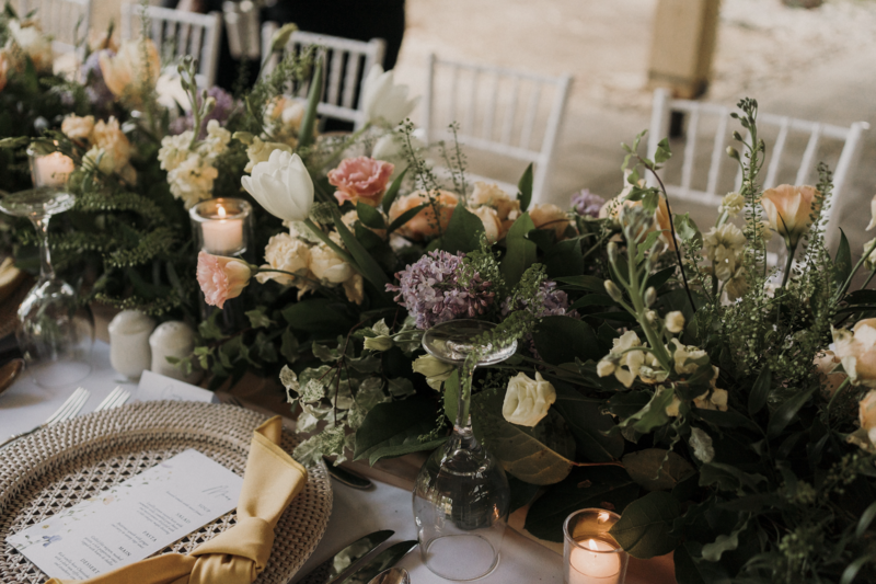 Beautiful wedding flower arrangement on table.
