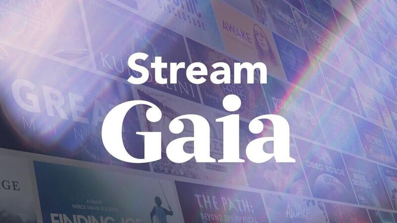 Promotional image for Gaia’s streaming service with a rainbow light overlay and titles of spiritual and consciousness-themed shows in the background.