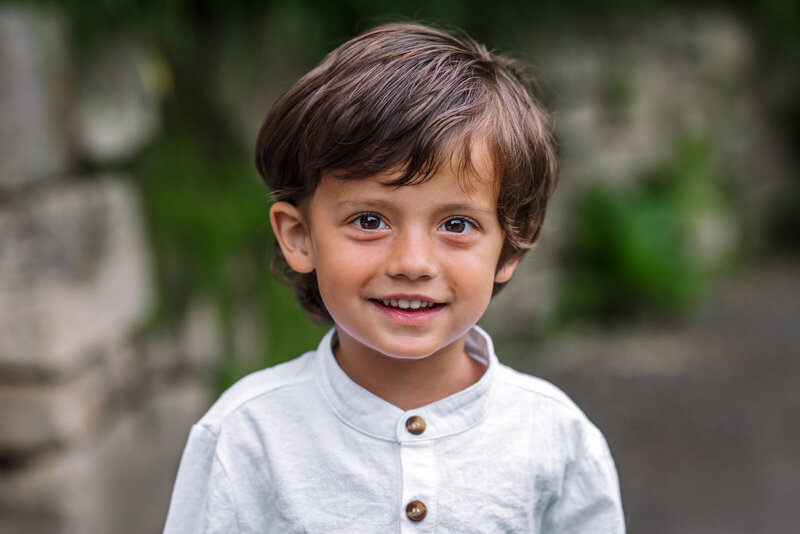 preschool portrait of a boy outdoors at school