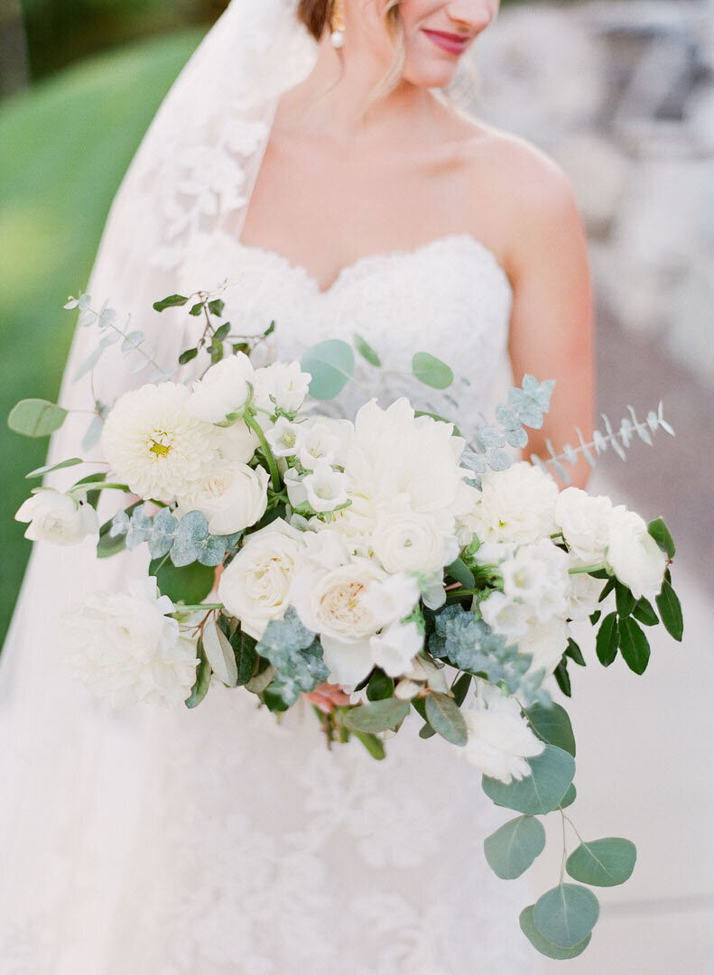 Bride Holding White Bouquet Photo