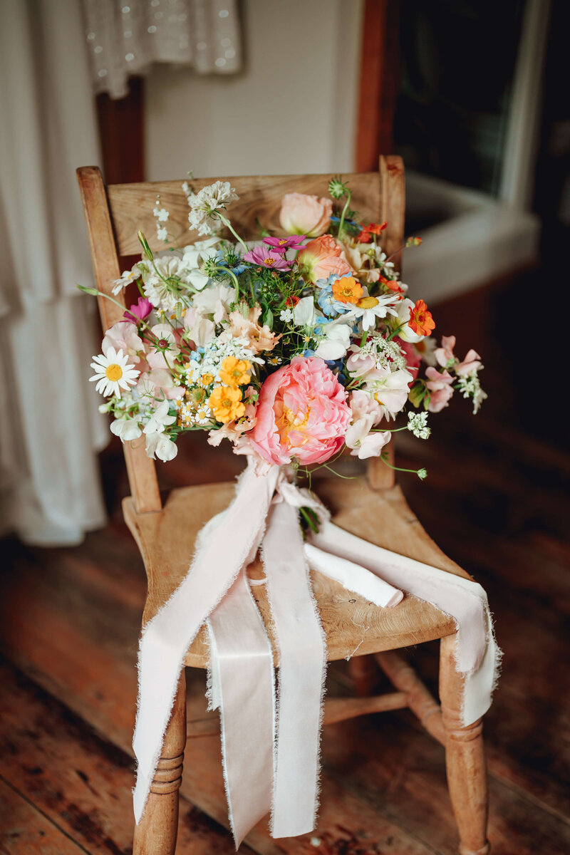 Bouquet of flowers on a chair at Haybarn Dulus