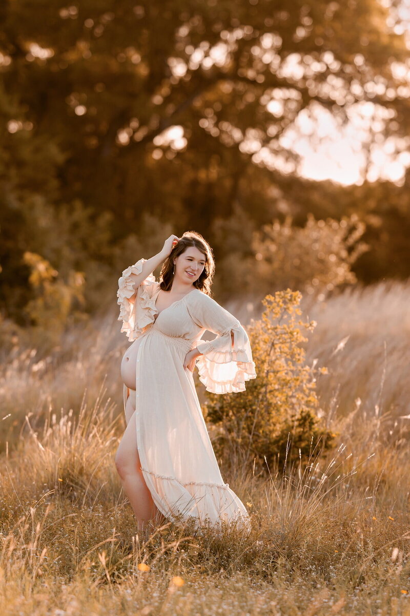 Lightweight neutral-toned robe with ruffle detail, styled for outdoor maternity shoot


