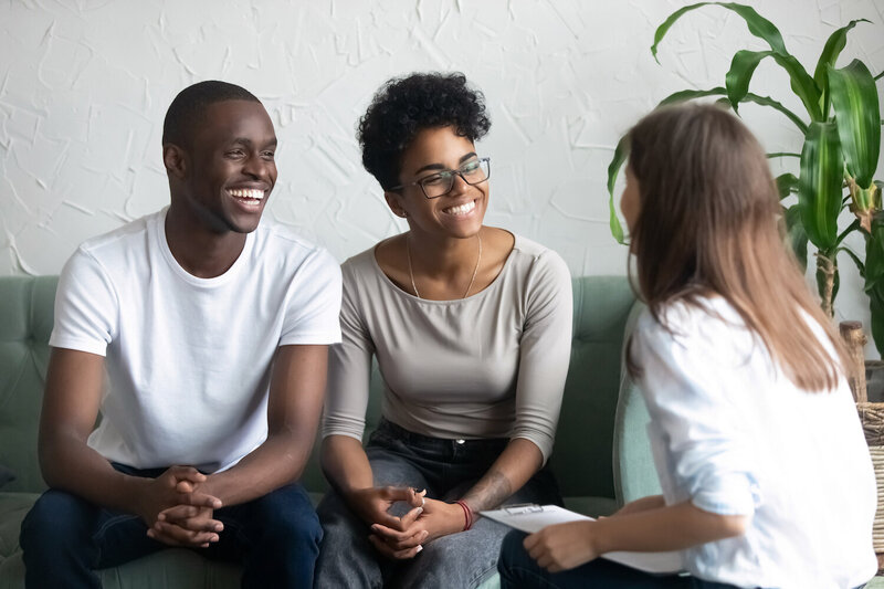 Happy Black couple at therapy session