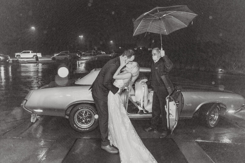 Bride and groom’s grand exit from Canyonwood Ridge reception hall