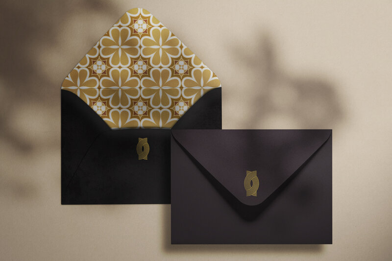 TSMC_Envelope Mockup_Black and Smoke