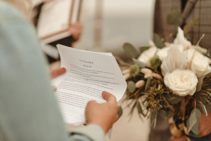 Close-up of a couple reading their wedding vows during an elopement in Pennsylvania