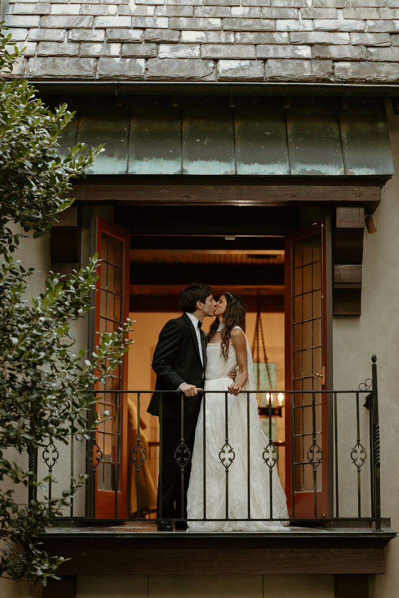 Bride and Groom walking through a tunnel made by their wedding party at the Grand Rapids Downtown Market.