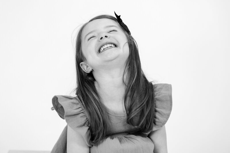 young girl laughing