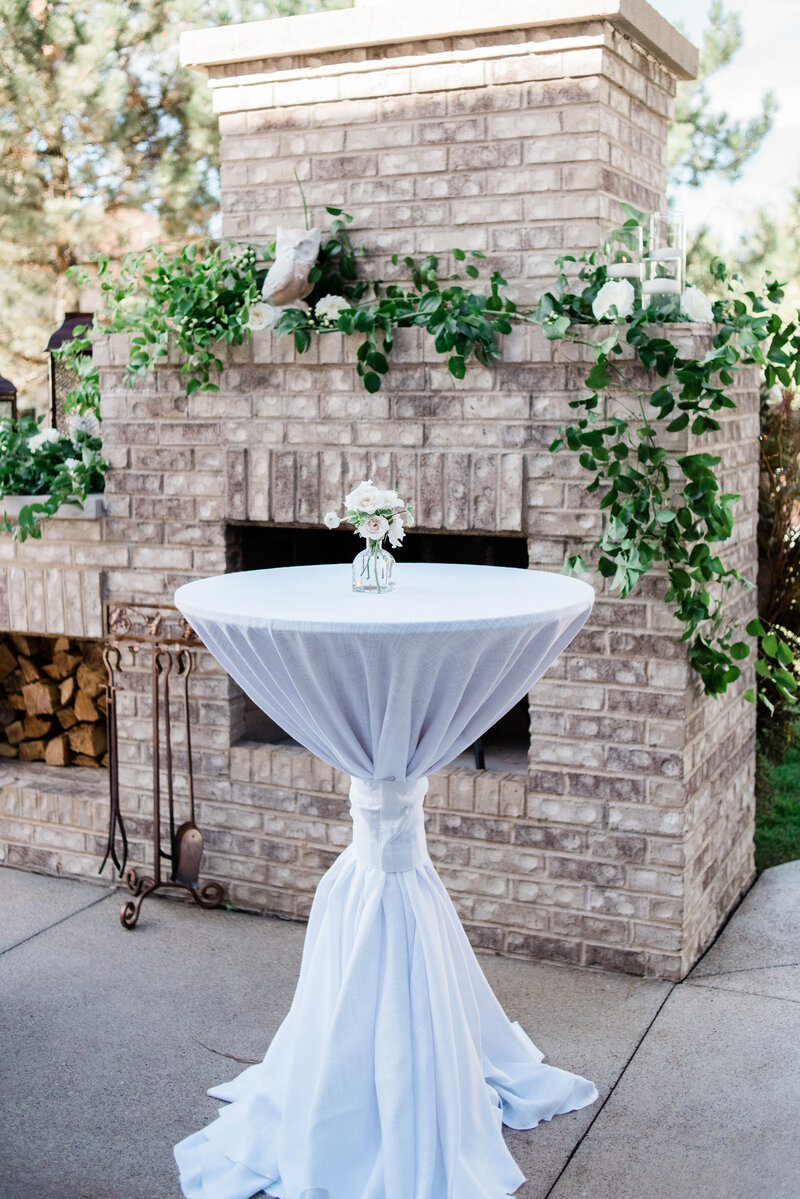 Outdoor wedding reception with white decor
