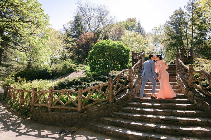 A couple ascends the stairs at Shakespeare garden in New York City's Central Park