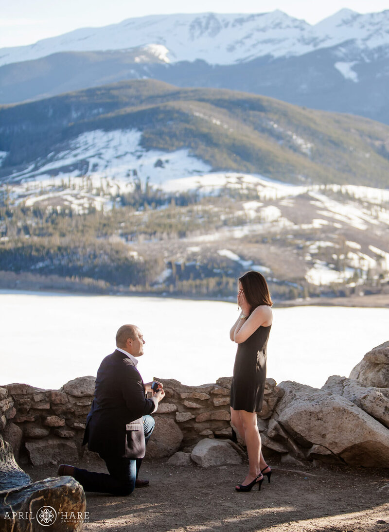A winter proposal photo for a couple at Sapphire Point in Summit County