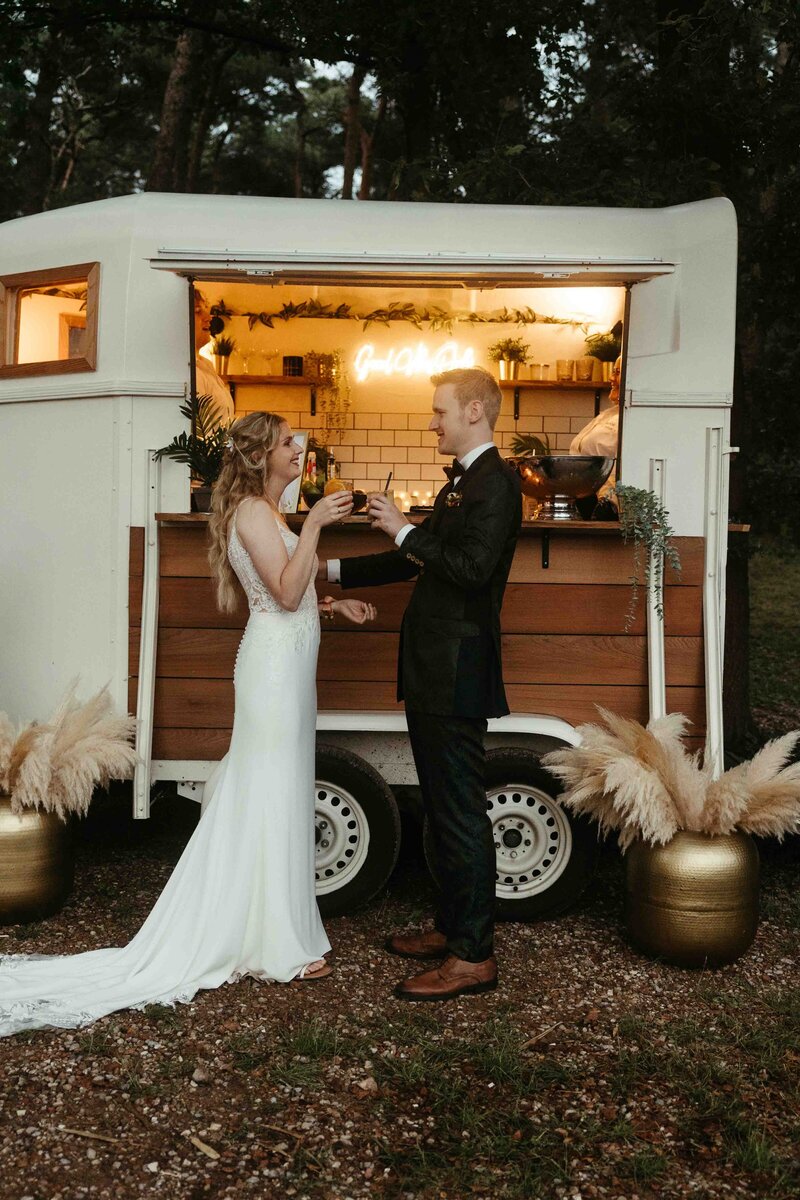 Get framed wedding photography bride and groom cheers cocktail