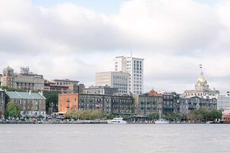 a photo of the Savannah river front a view of River Street from  the Westin Hotel on Hutchinson Island in Savannah GA captured by Savannah photographer Magnolia West Photography