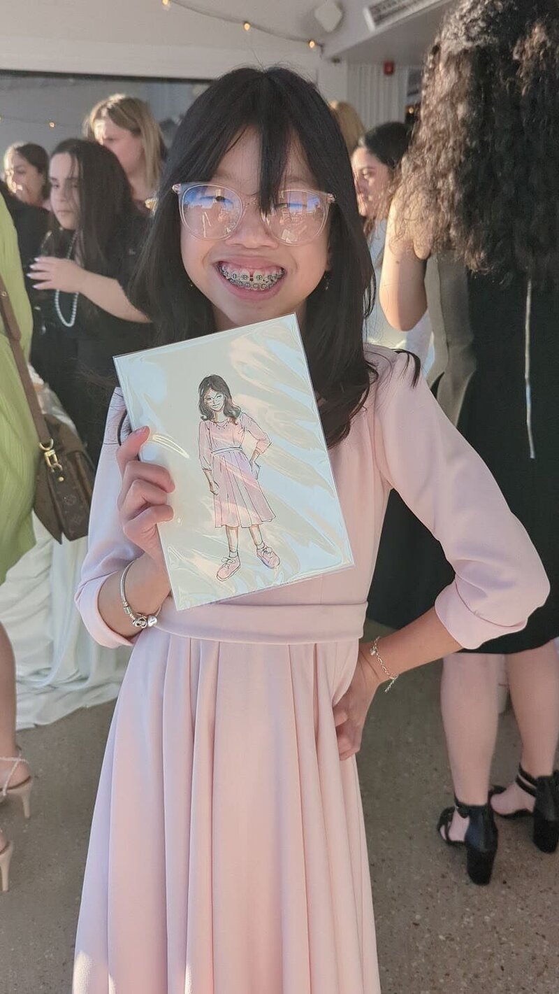 little-girl-shows-her-live-portrait