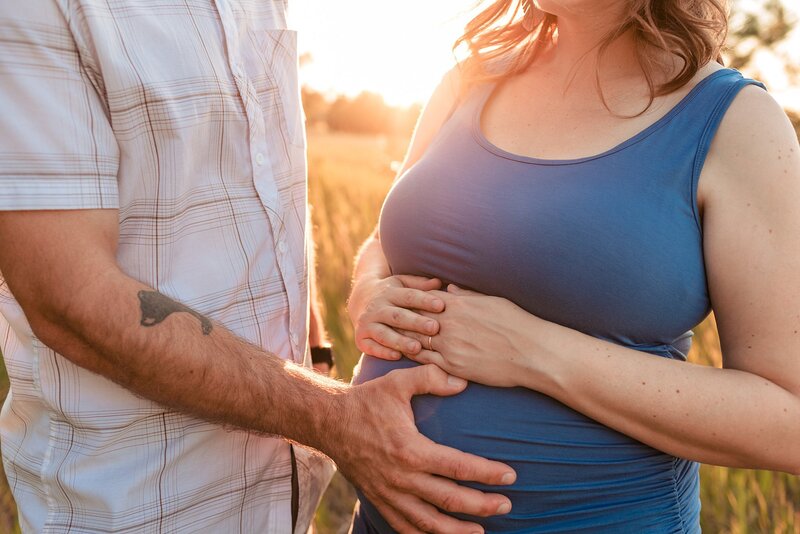Golden hour maternity photos in Spokane WA in field