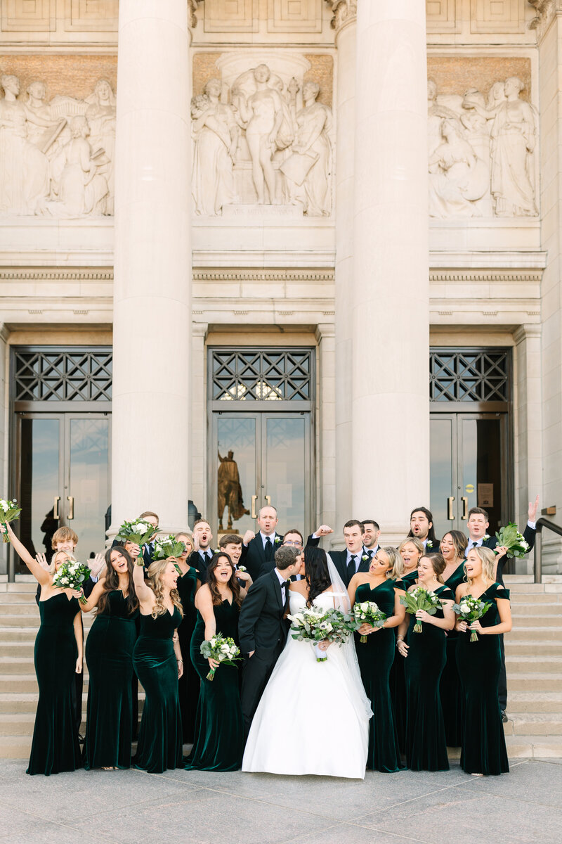 bride and groom kiss on wedding day in St. Louis, Marriott St. Louis Grand wedding