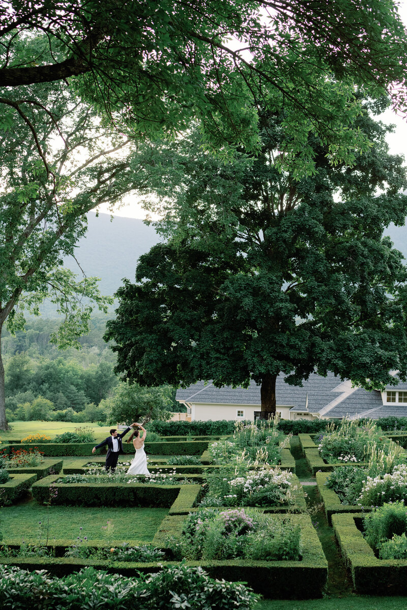 bride and groom dance in gardens at hildene in manchester vt