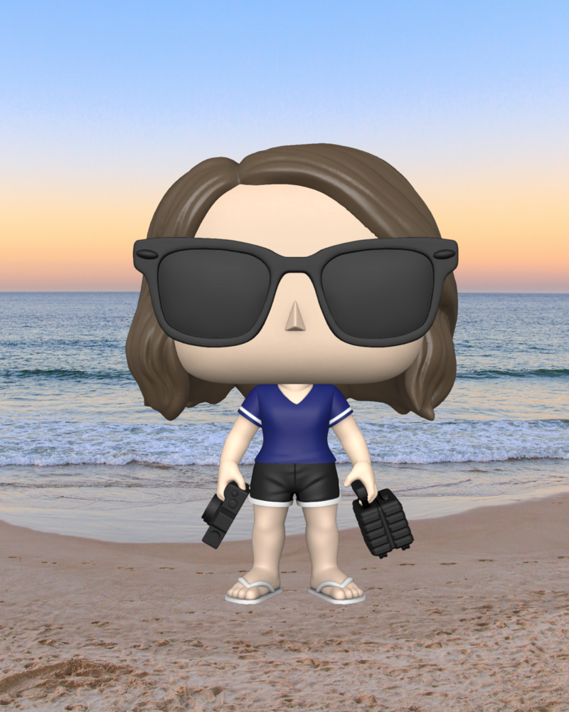 Funko Pop of Darcy with pickleball paddle in one hand and coffee in the other with a beach background. A unicorn on the side of Darcy.