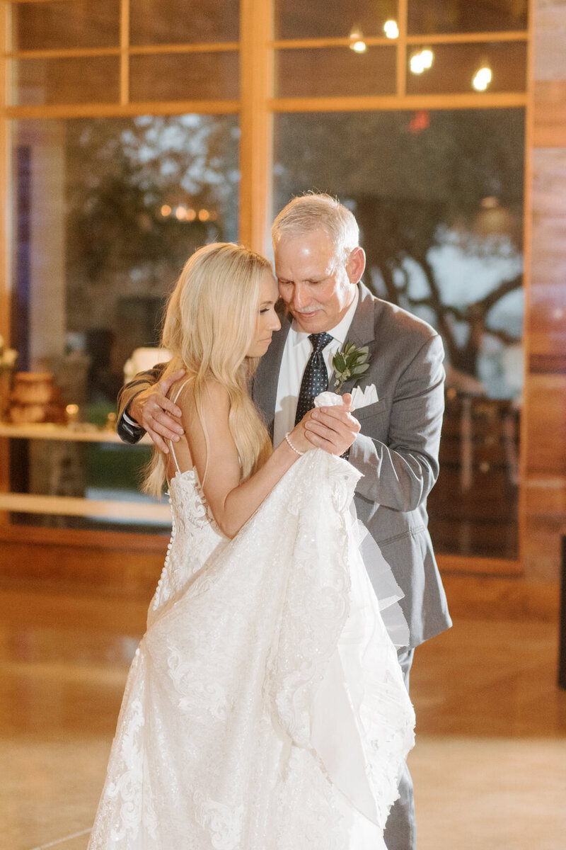 Reception decor in Canyonwood Ridge hall with romantic lighting and Hill Country details