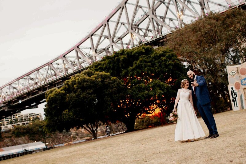 Happy wedding couple taking a selfie