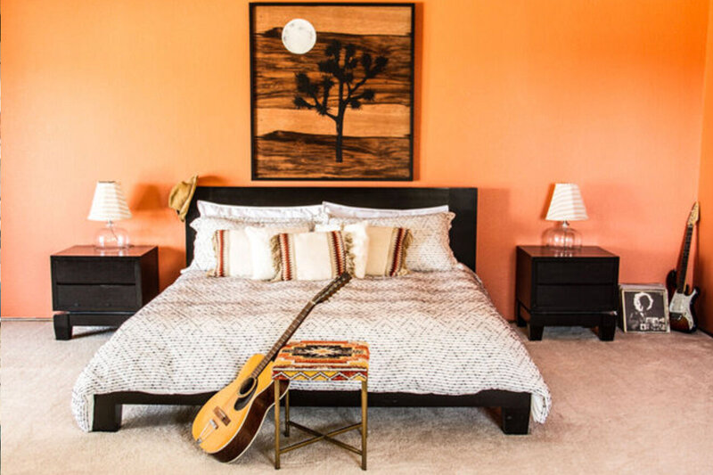 Branding photograph Gatos Trail Studio master bedroom with guitar at foot of bed