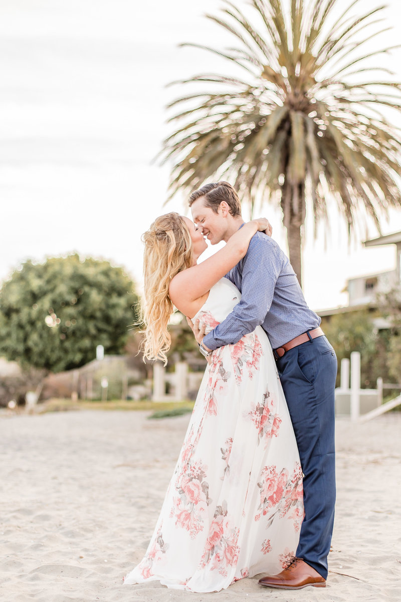 Couple kissing in point loma beach engagement session by san diego engagment photographer - Camila Margotta 3