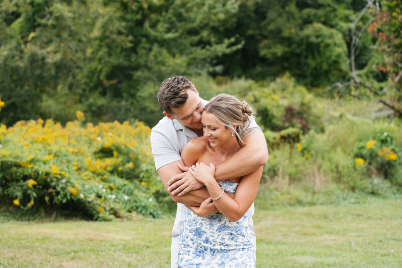 Couple having their engagement photos done in the summer 