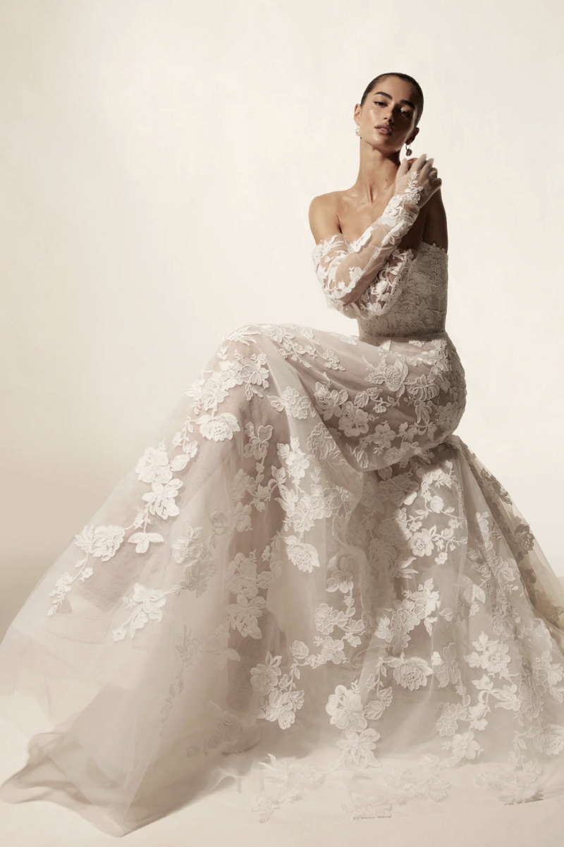 Lace gown with straight neckline corset bodice and soft ballgown skirt.